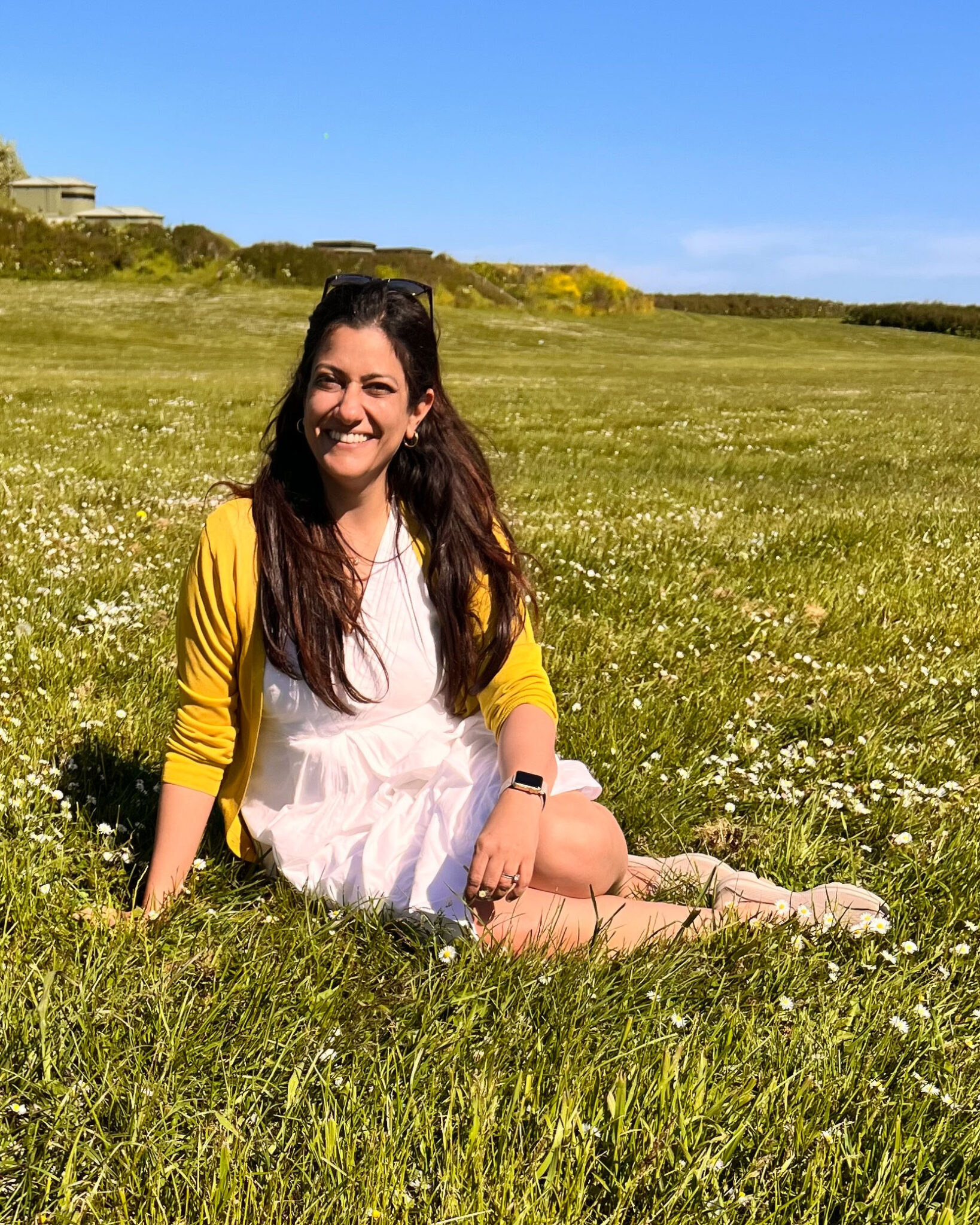 Ravina smiling in a spring meadow